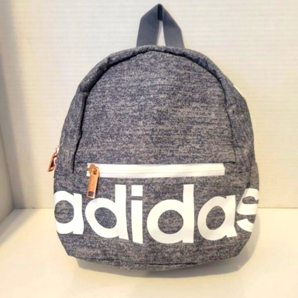 adidas Handbags - X- posted •Adidas mini backpack/purse• EUC, sanitized & ready• adjustable straps